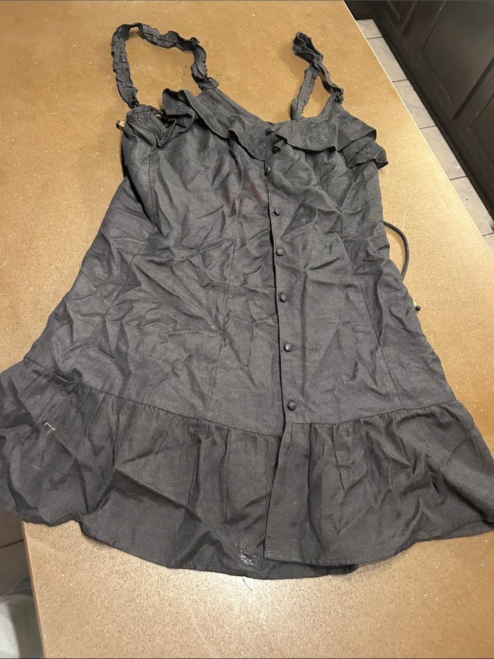 Sleeveless Black Ruffle Button-Front Women's Top